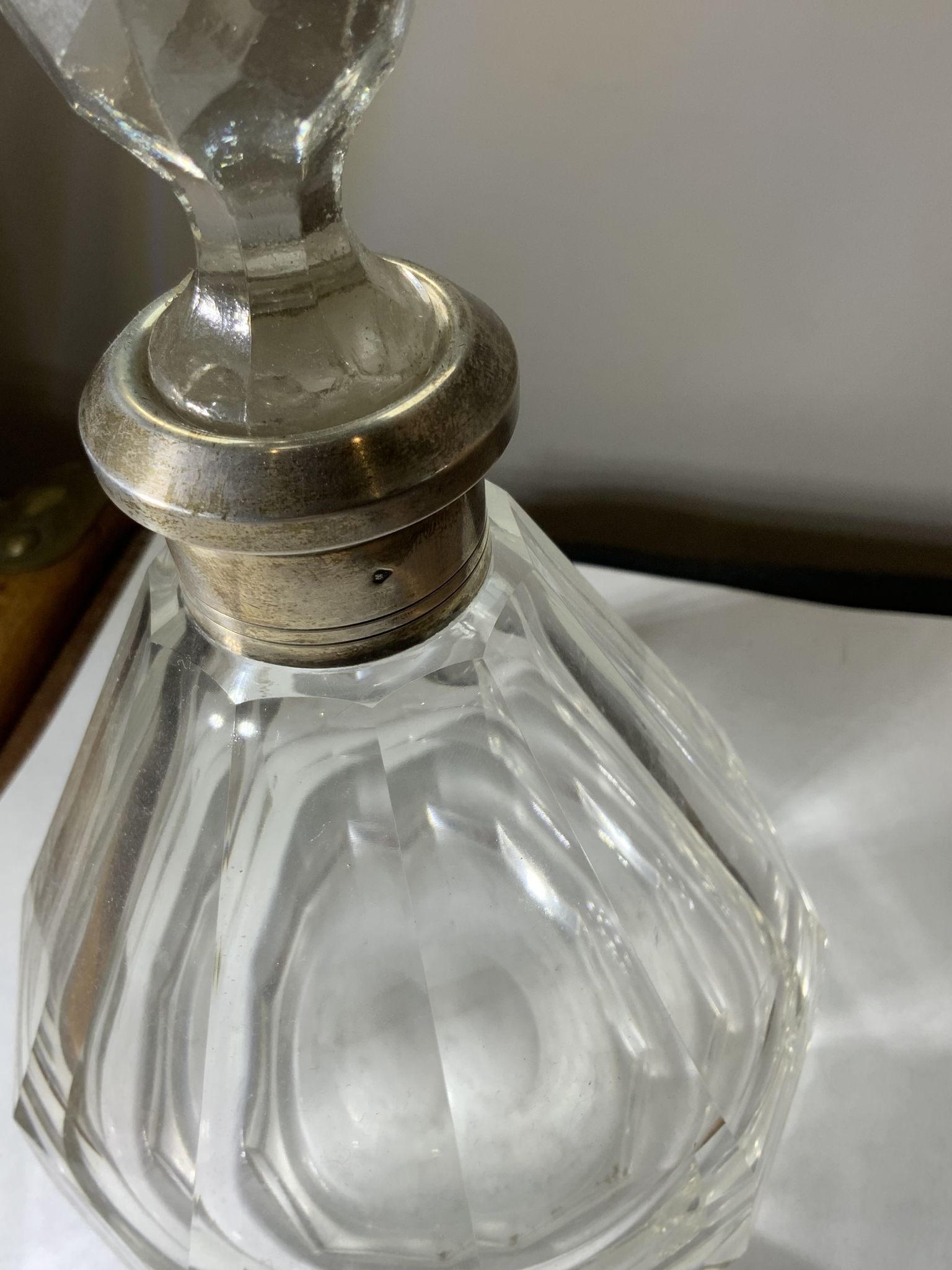 Antique crystal bottle with art deco hallmarked silver neck with facets