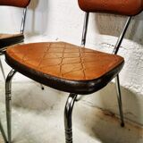 Pair of chrome and skai chairs