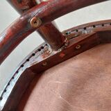 pair of round bistro chairs with a pattern on the seat, vintage