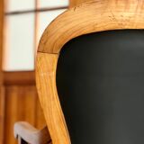 Wood and leather armchair