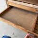 Low workshop cabinet with 8 drawers in solid wood, printing style.