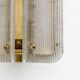 Pair of Curved Clear Ribbed Murano Glass and Brass Wall Sconces