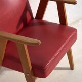 2 red armchairs, circa 1960