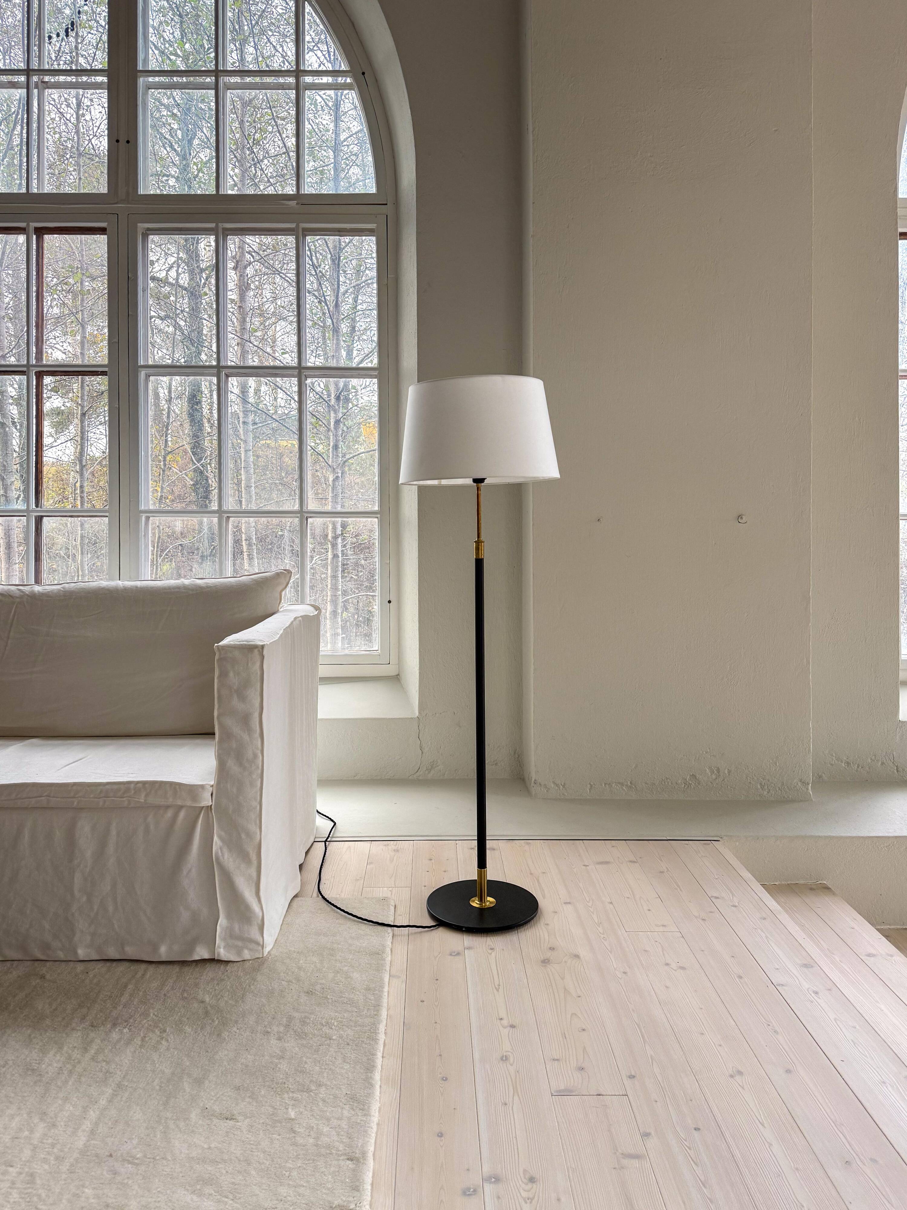 Modern mid-century floor lamp by Aage Petersen, for Le Klint, Denmark, 1970s.