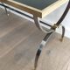 Table basse en acier brossé et laiton. Maison Jansen