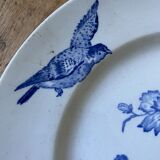 Plate decorated with blue birds and butterflies