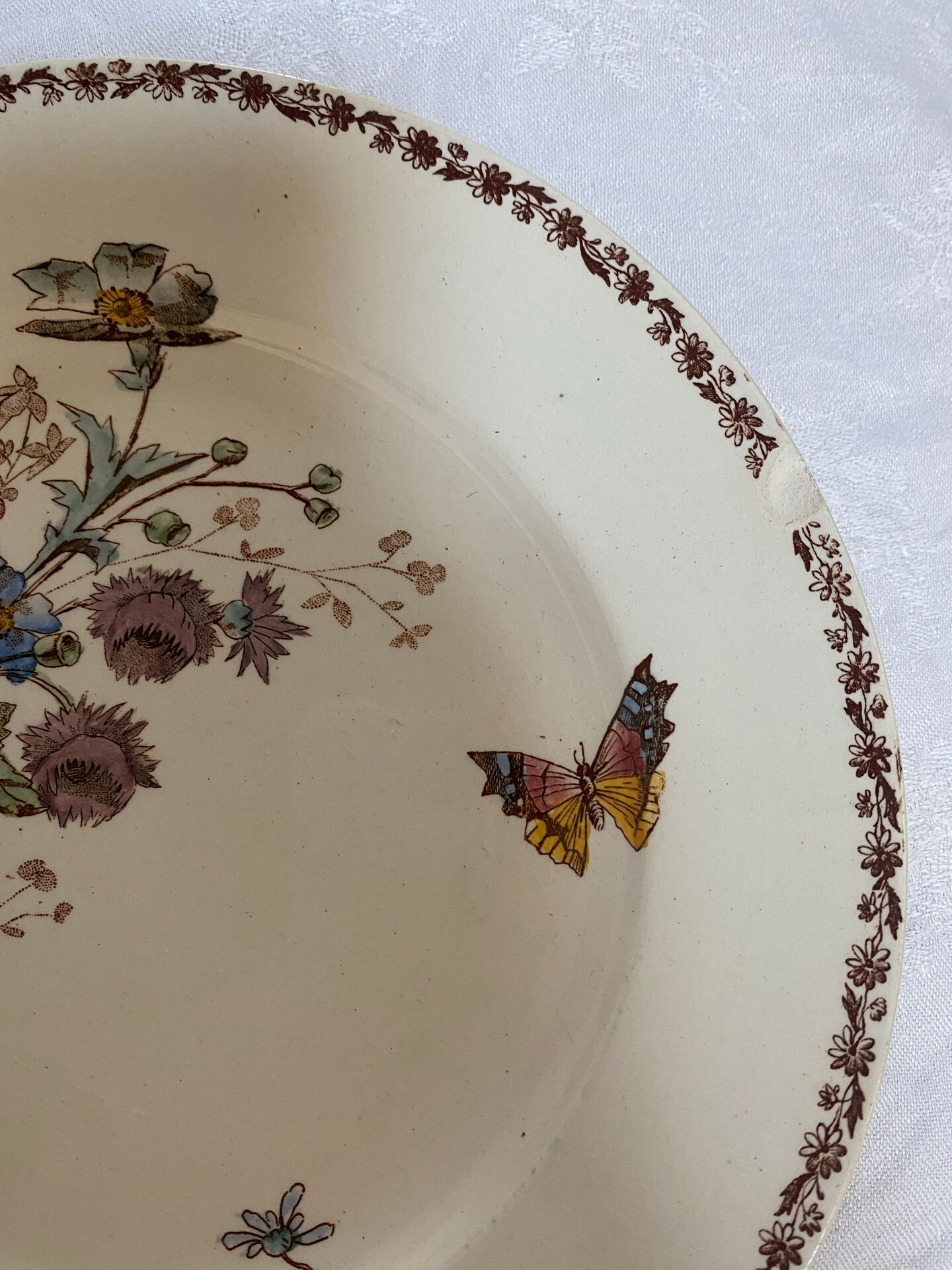 Set of 3 flat plates in polychrome ironstone E. Bourgeois