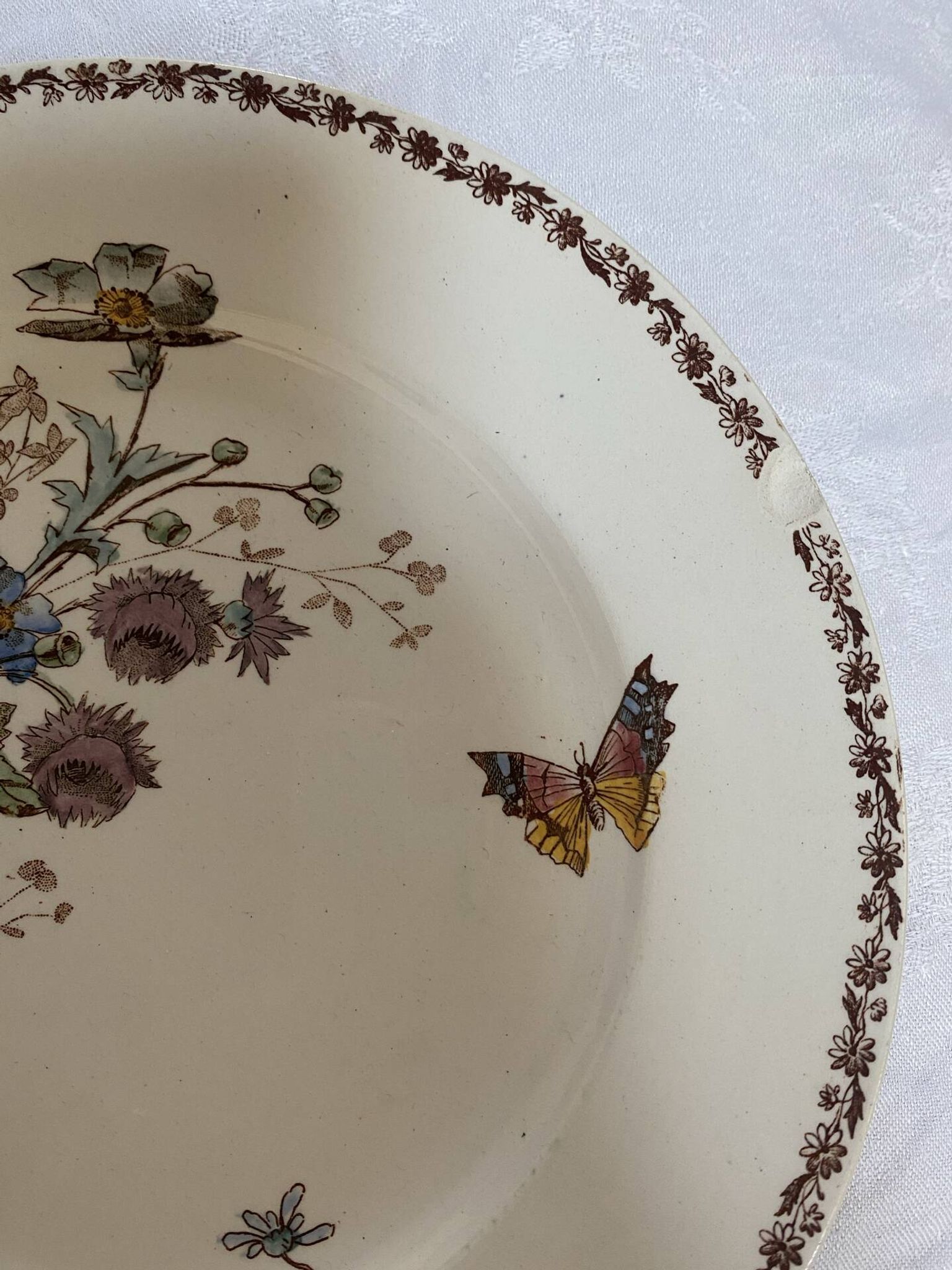 Set of 3 flat plates in polychrome ironstone E. Bourgeois