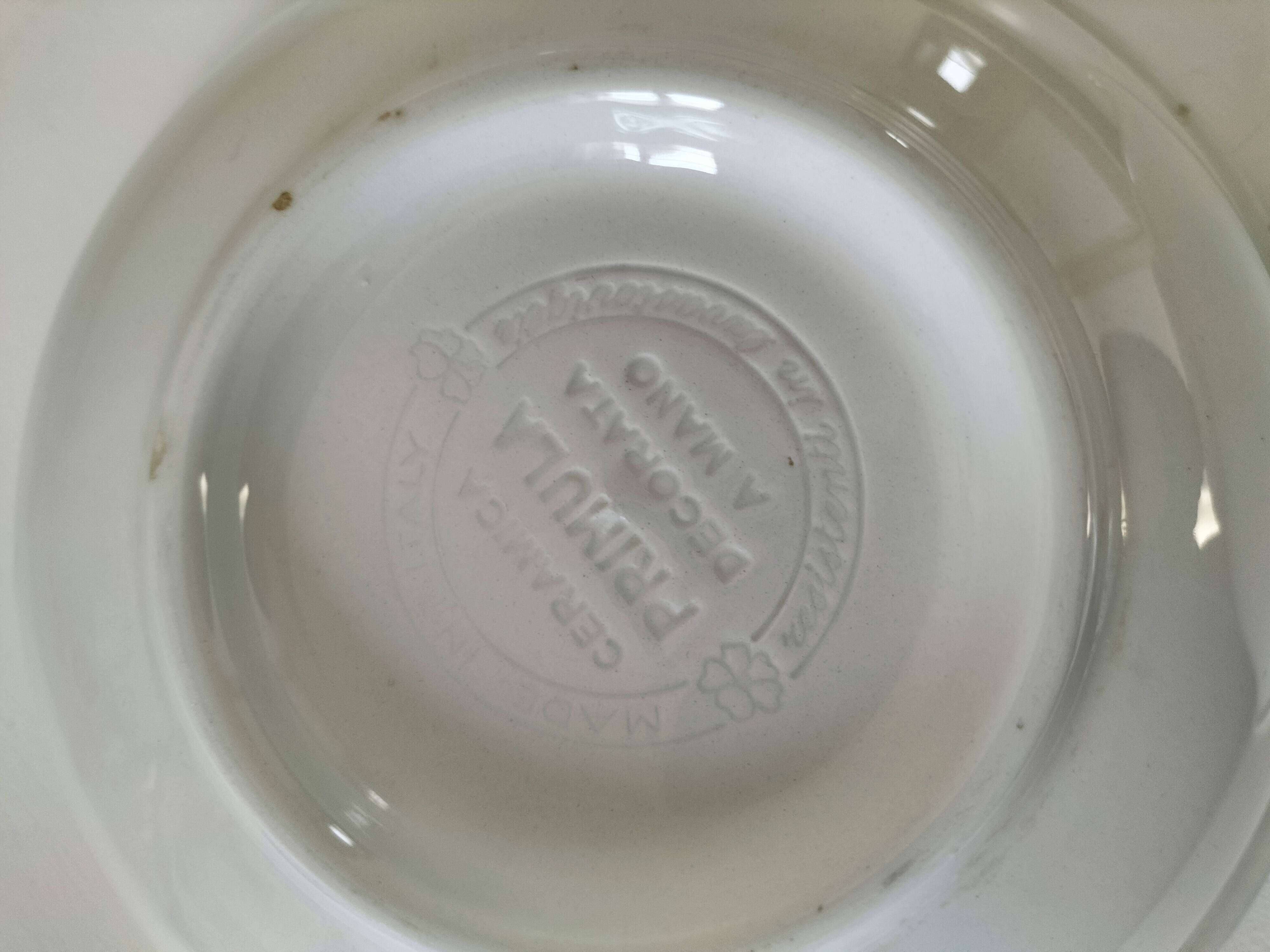 Trio of Italian 1970s deep plates, ochre brown floral decoration