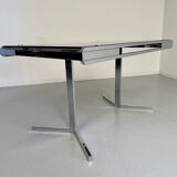 Smoked glass dining table with chrome legs, 1970s design by Roche Bobois.