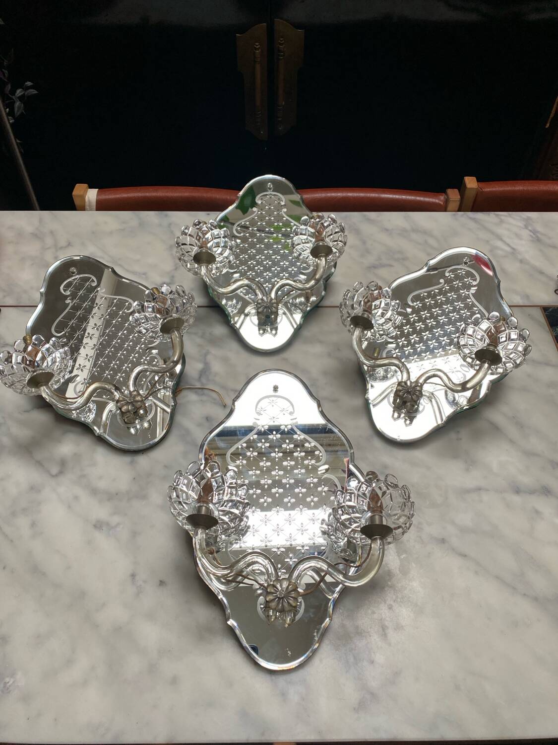 Venetian wall lights with Baccarat crystal mirror.