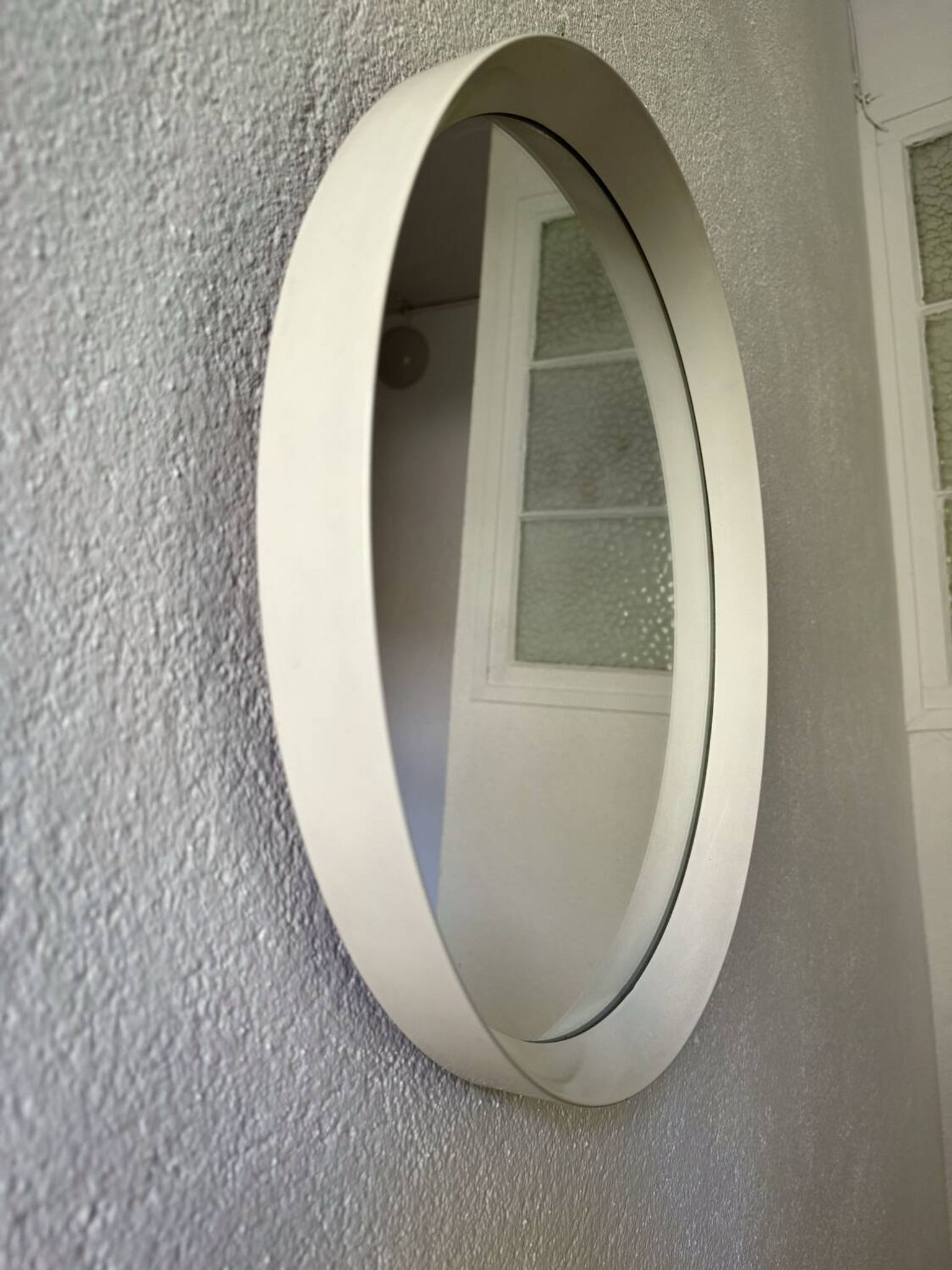Scandinavian white round mirror from the 60s