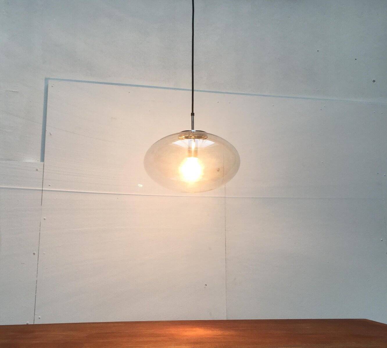 Suspended UFO-shaped glass luminaires in mid-century German Space Age style, set of 3.