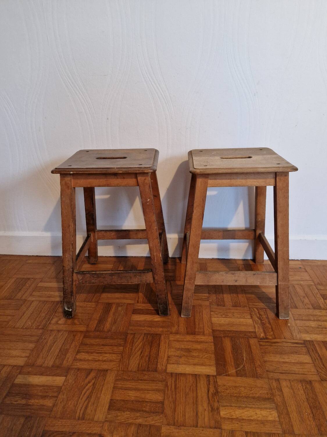 Pair of antique wooden workshop stools