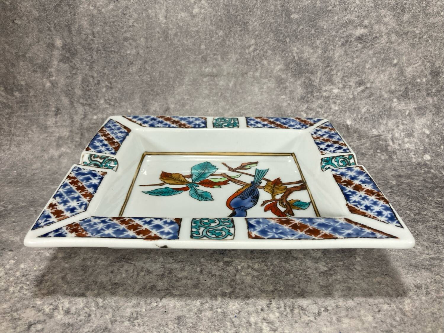 Ashtray. Trinket dish. Japanese porcelain. Blue bird on an autumn branch