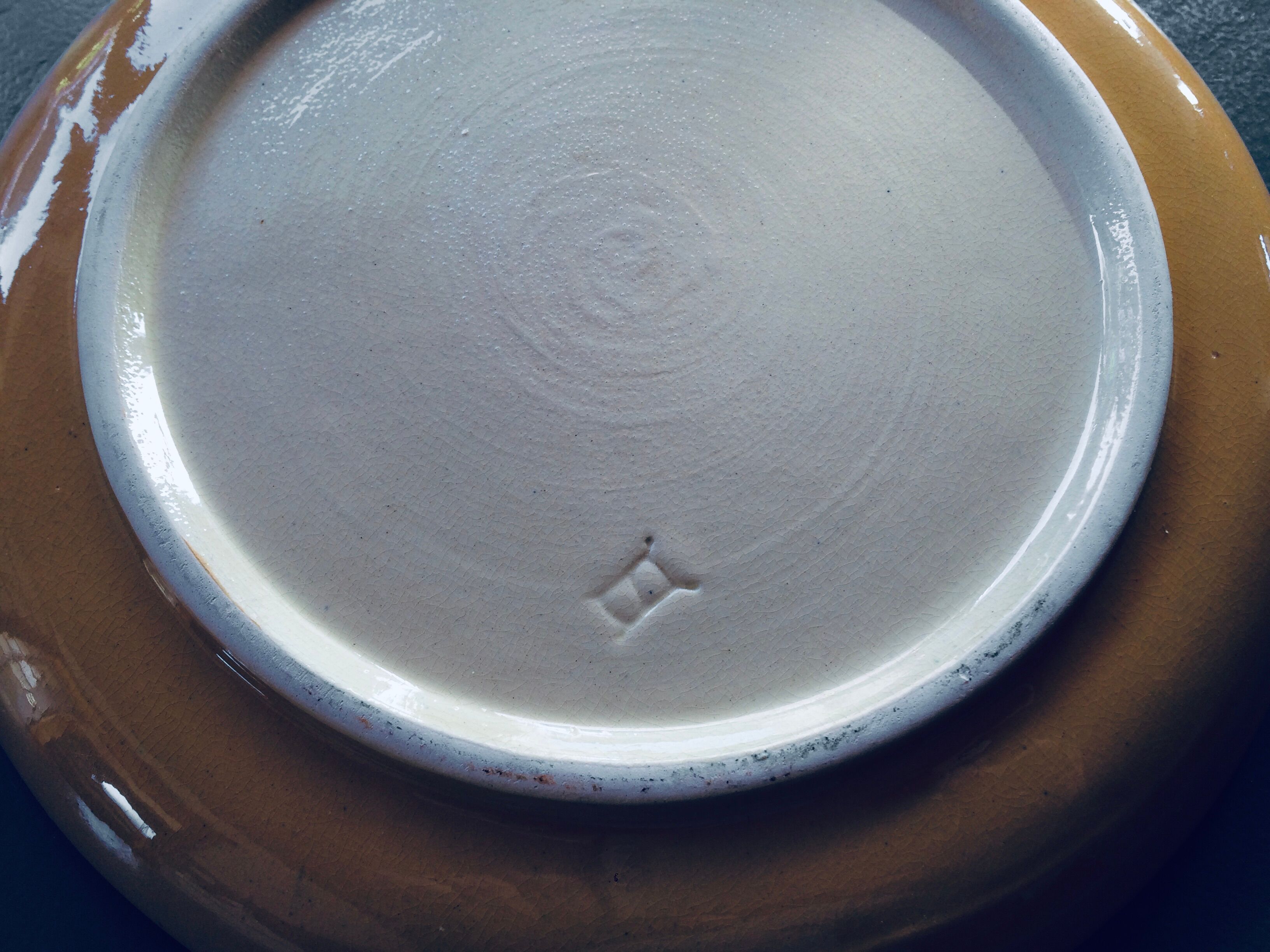 The six Piaf plates in painted terracotta