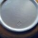 The six Piaf plates in painted terracotta