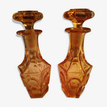 Pair of bottles amber-colored