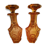 Pair of bottles amber-colored