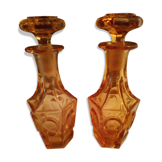 Pair of bottles amber-colored