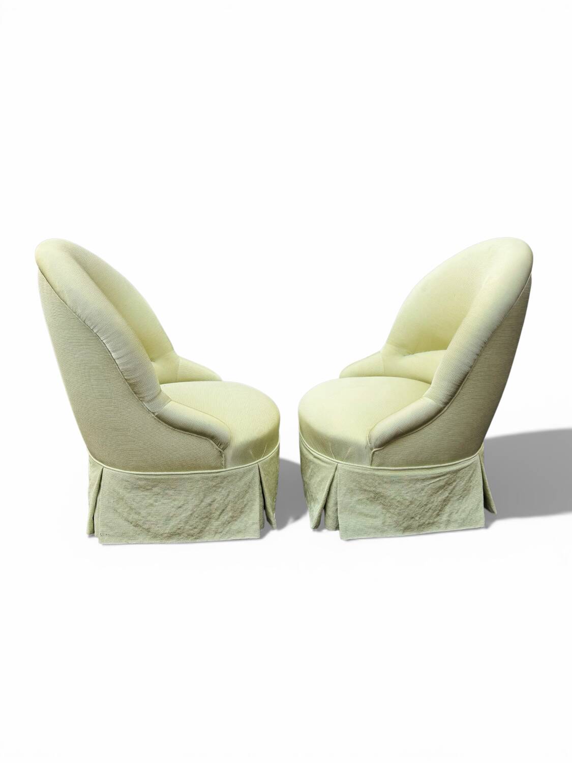 Paire de fauteuils crapaud tapissés pastel vert pomme