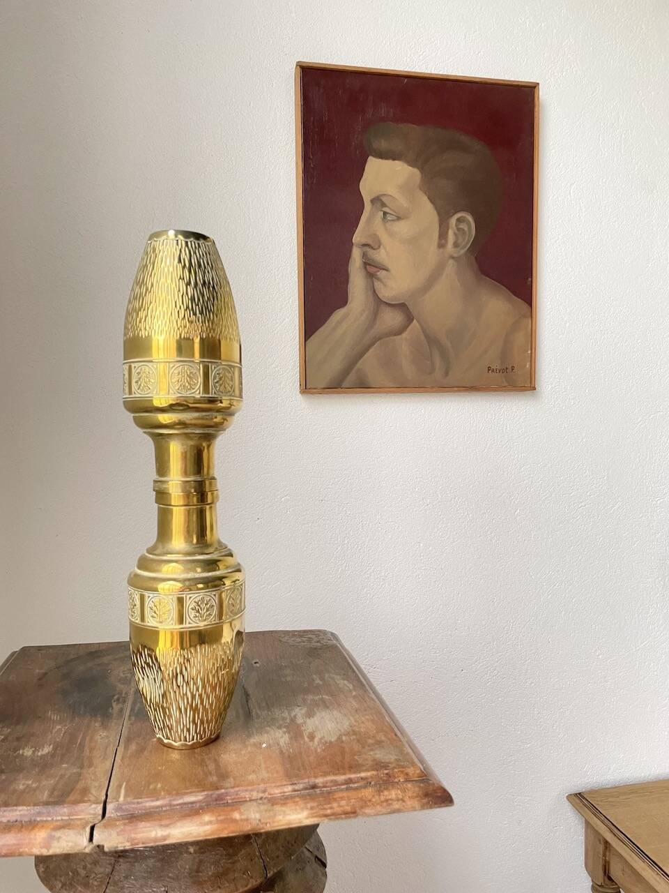 Duo of embossed brass vases