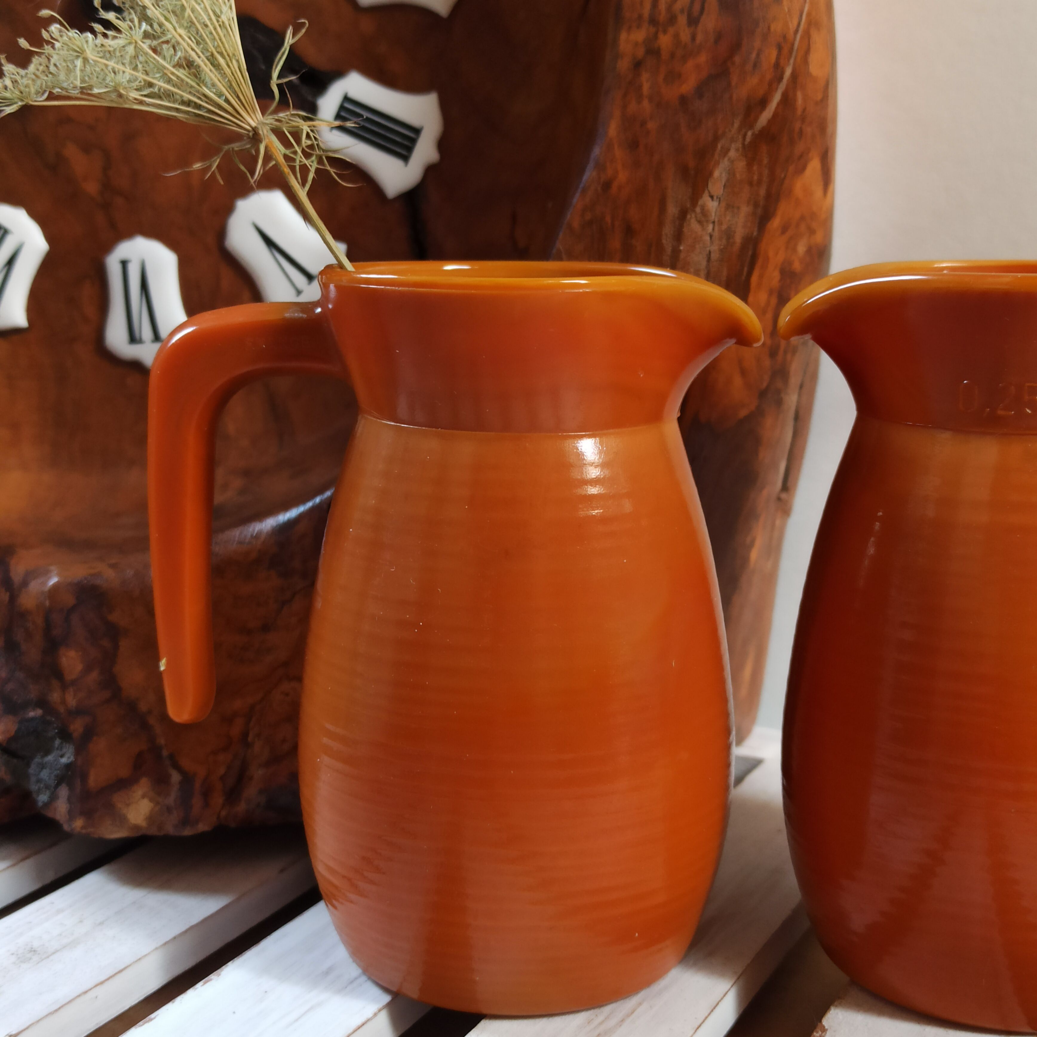 Two vintage arcopal volcano pitchers