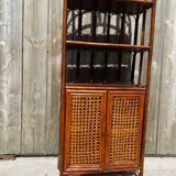Library shelf, vintage rattan storage unit and canning.