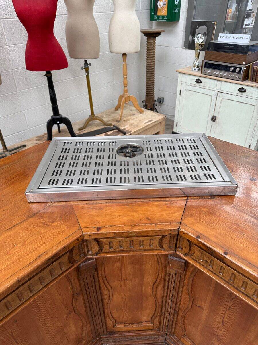 Large corner bar counter from the late 19th century.