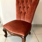 Petit fauteuil capitonné
