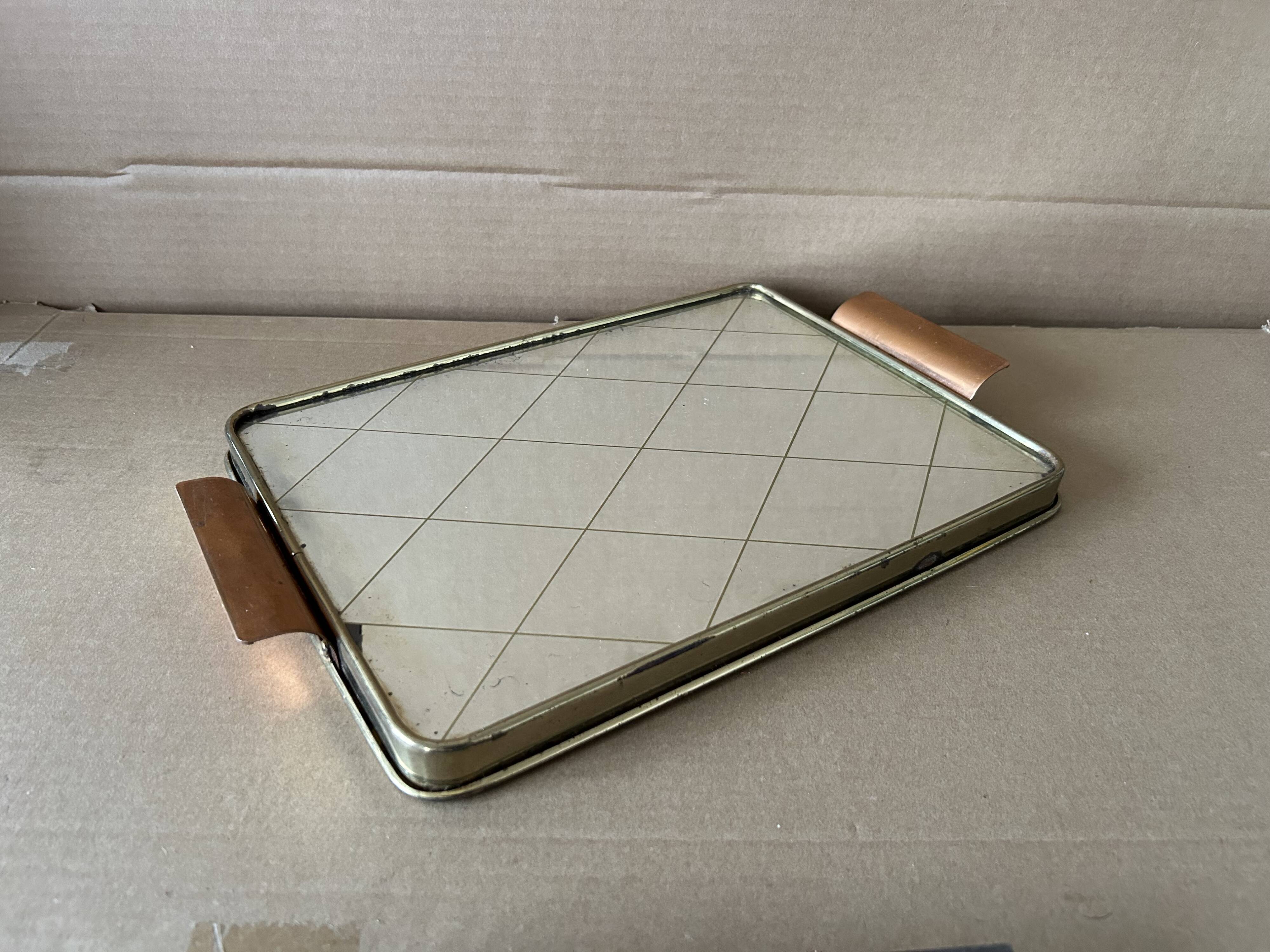 Metal tray and antique mirror