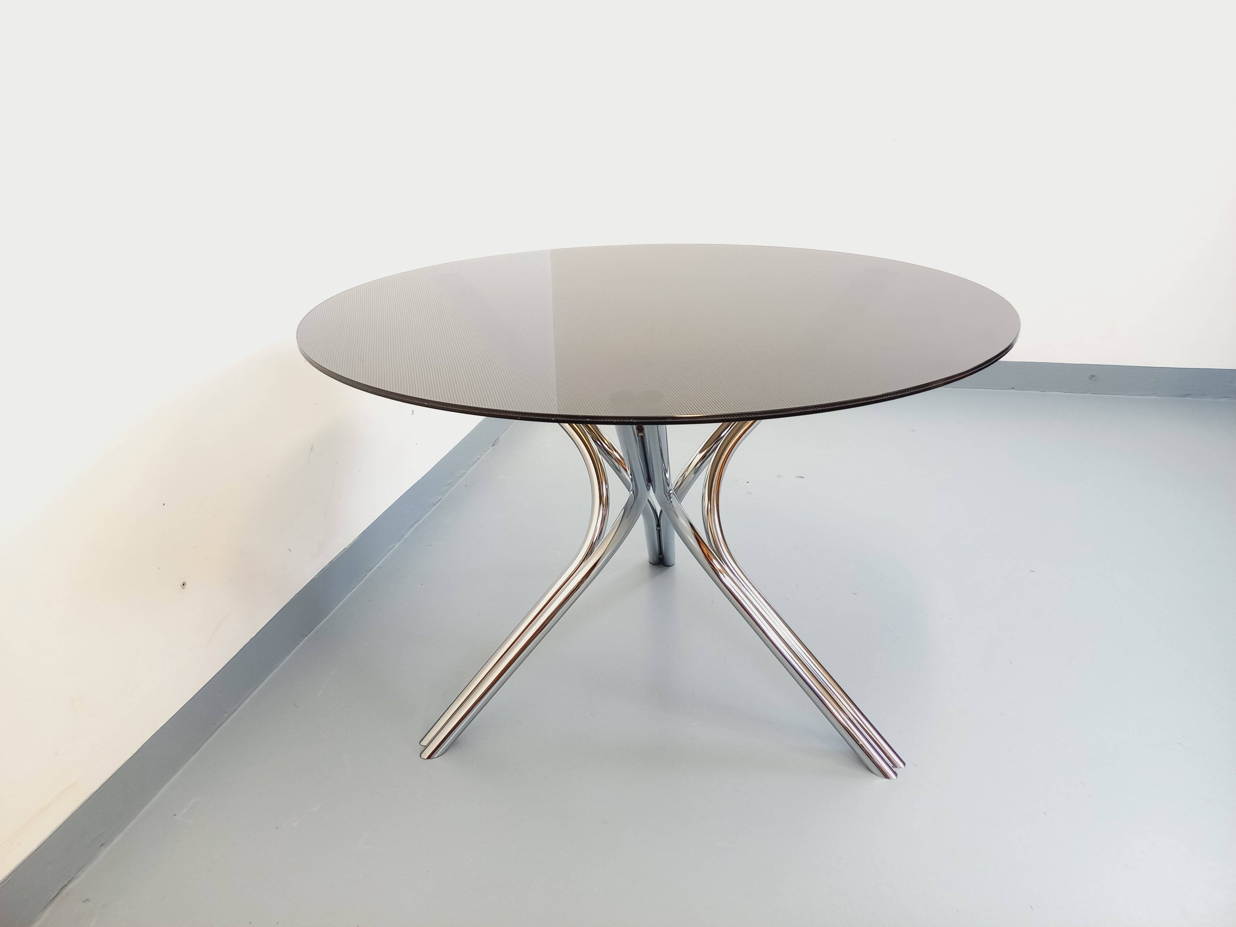 Vintage dining table in smoked glass plexiglass and chrome metal.