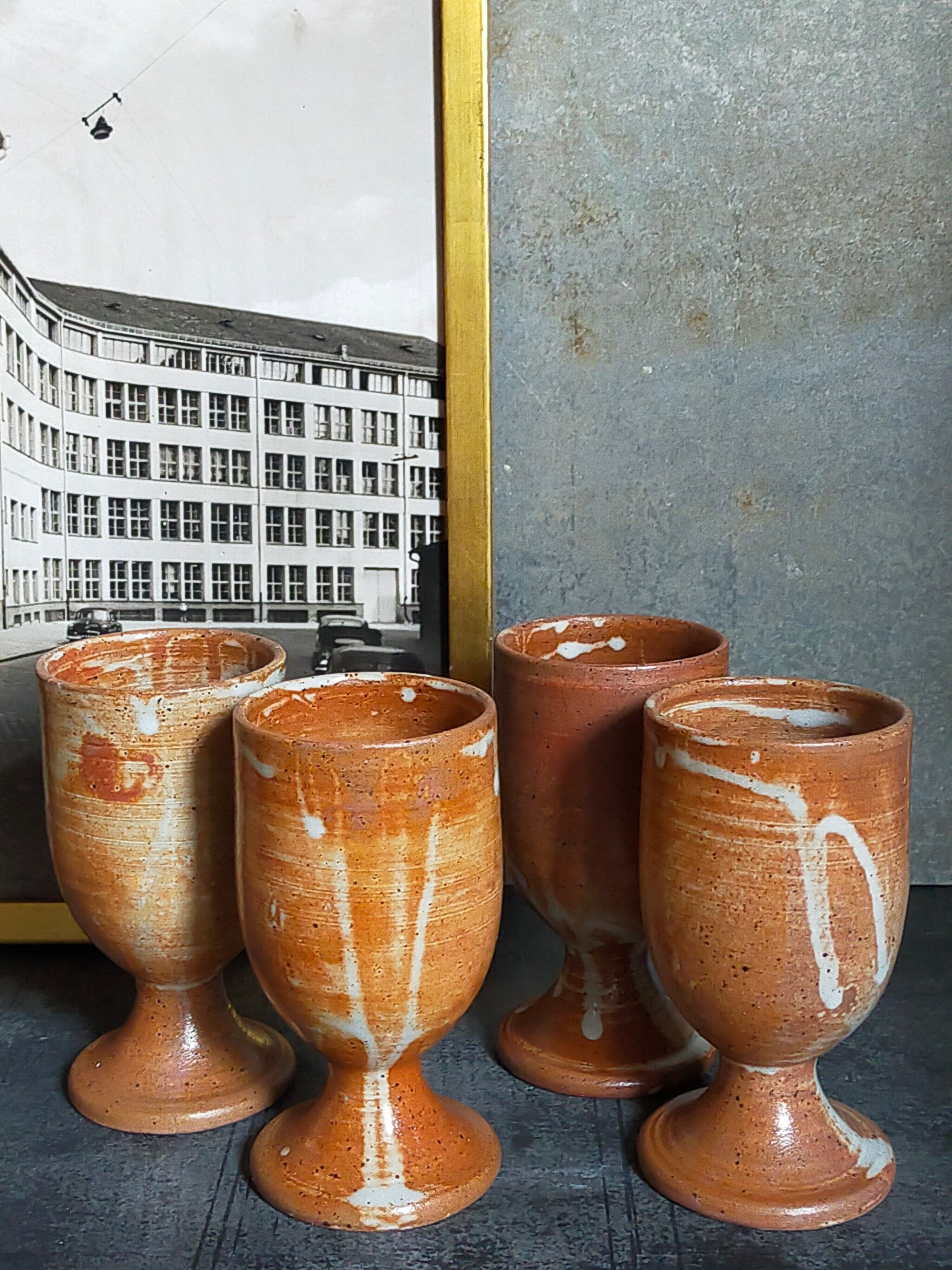 Four potter's mugs turned in vintage light stoneware