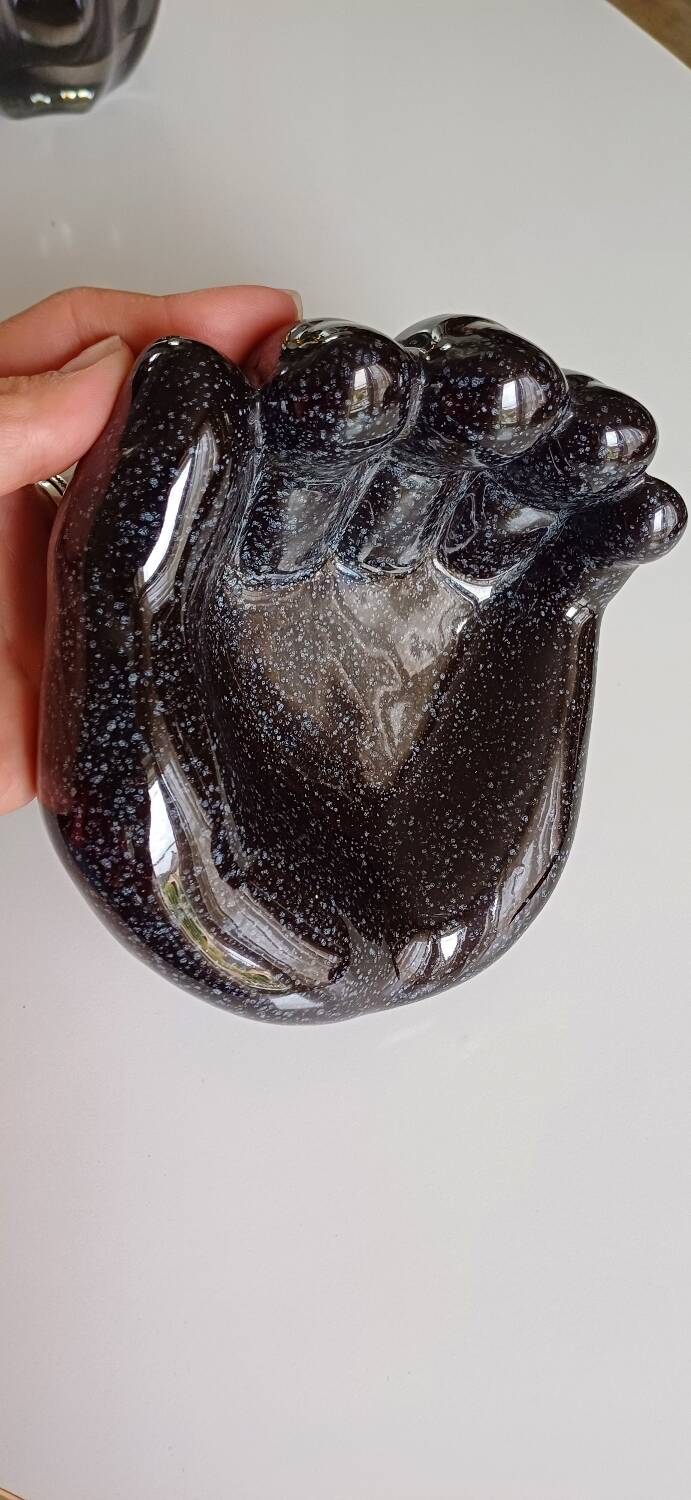 Ceramic hand emptier