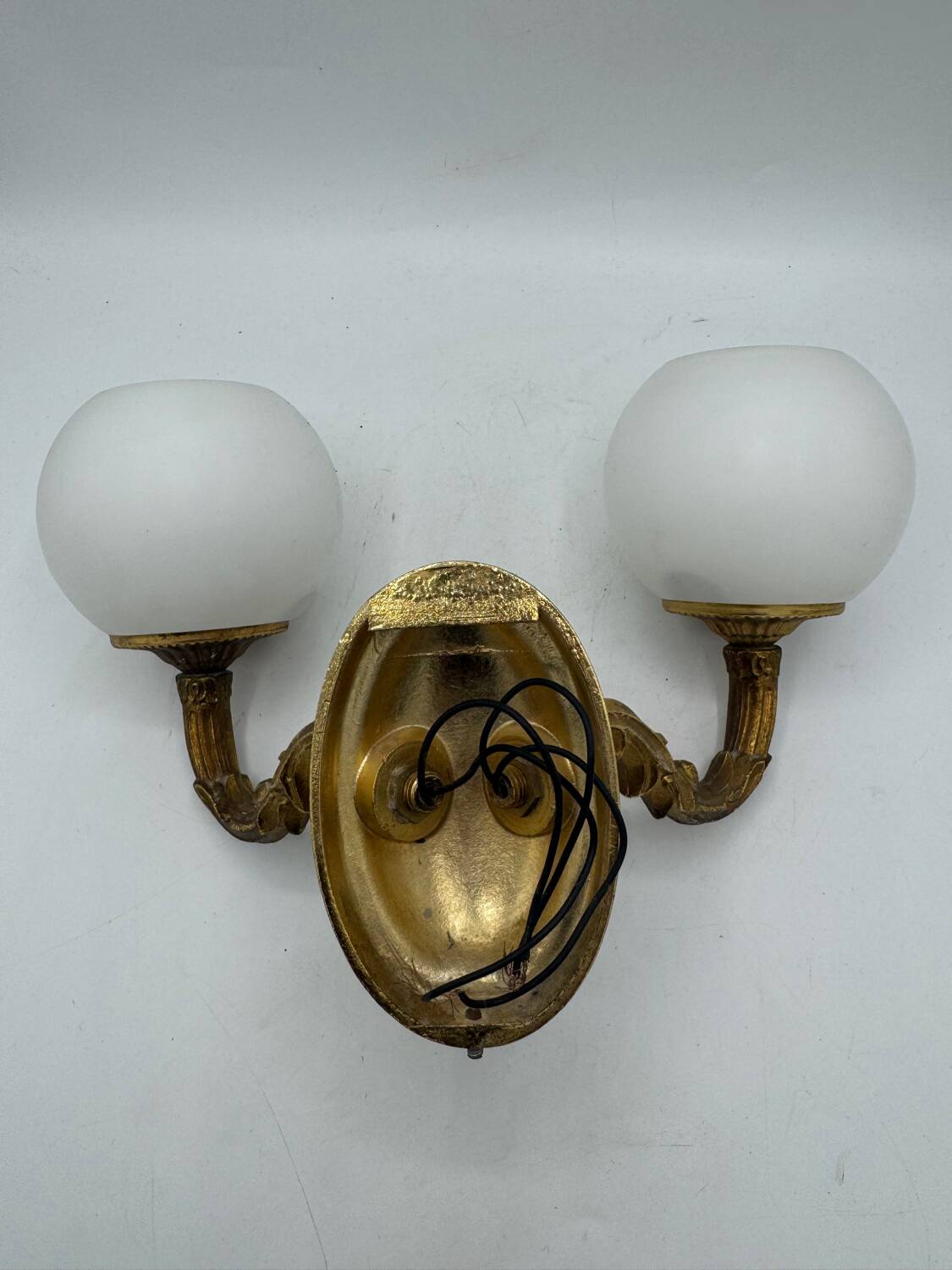 Double gold wall light