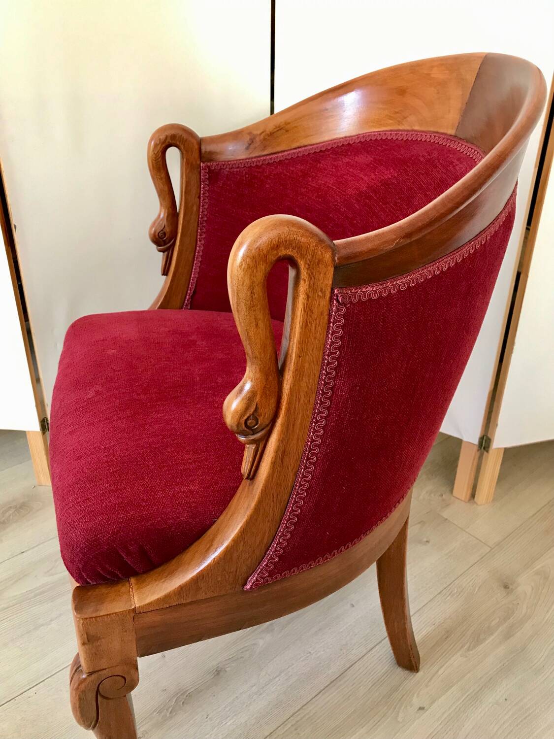 Empire-style armchair with swan necks