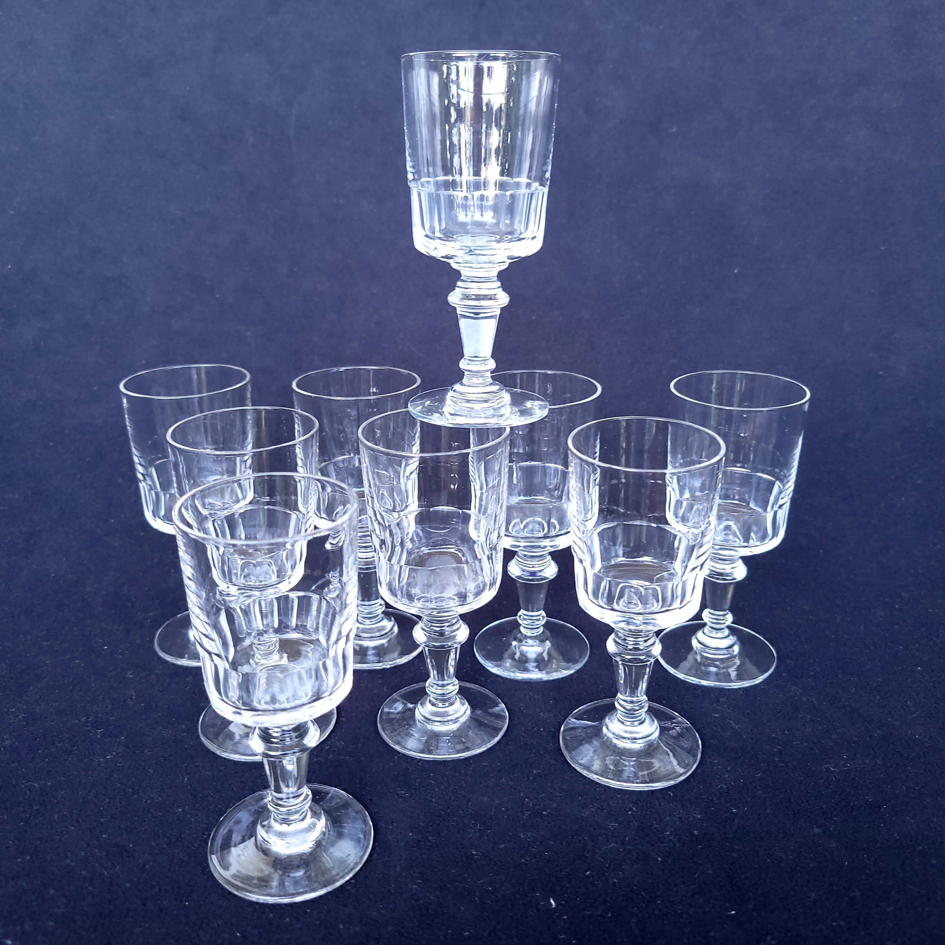 9 old wine glasses or liqueur XIXth in glass cut with 11 sides