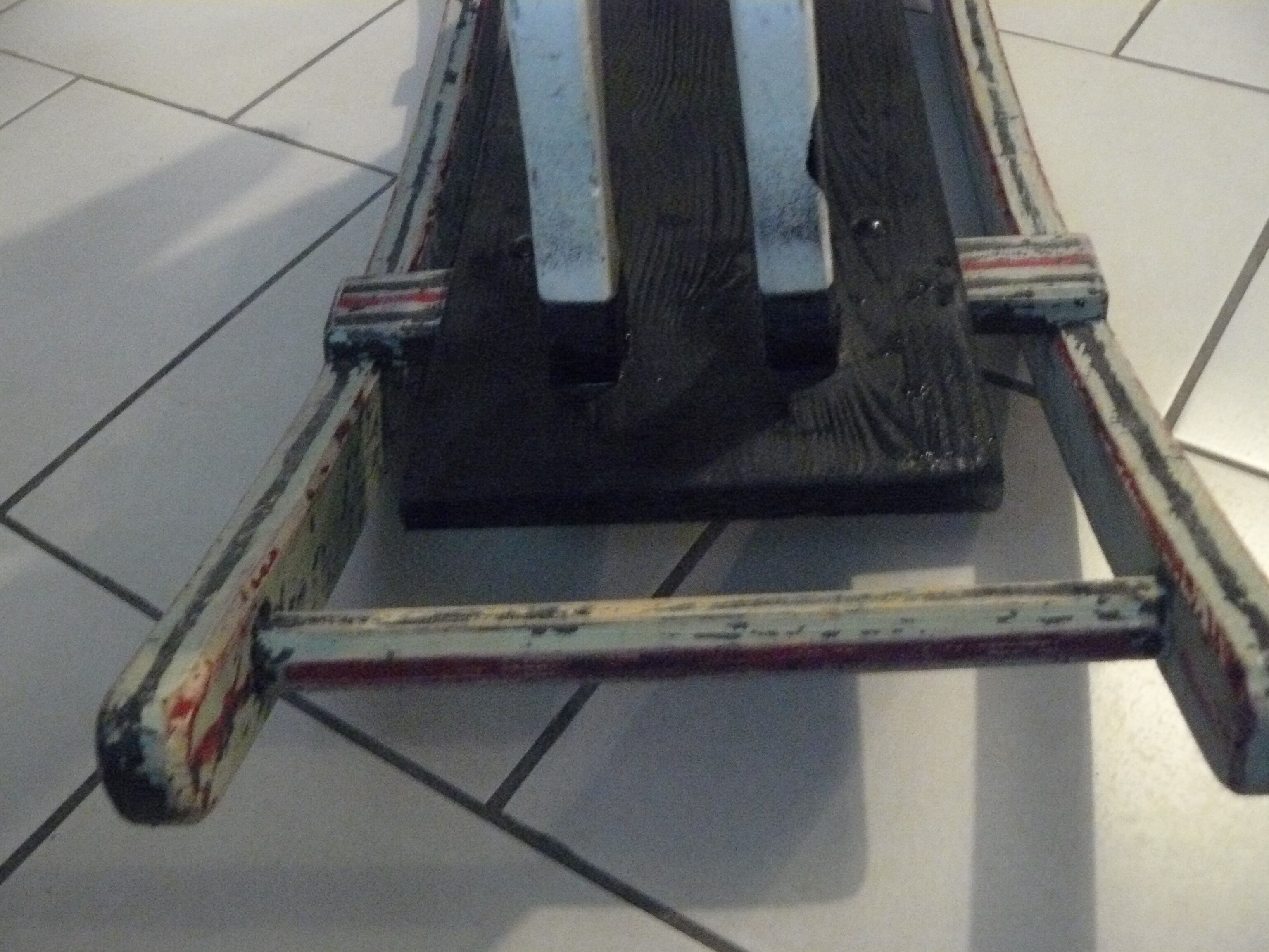 Old rocking horse in painted wood