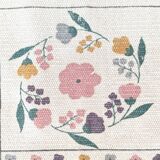 1980s handwoven cotton rug with a cat and flower pattern