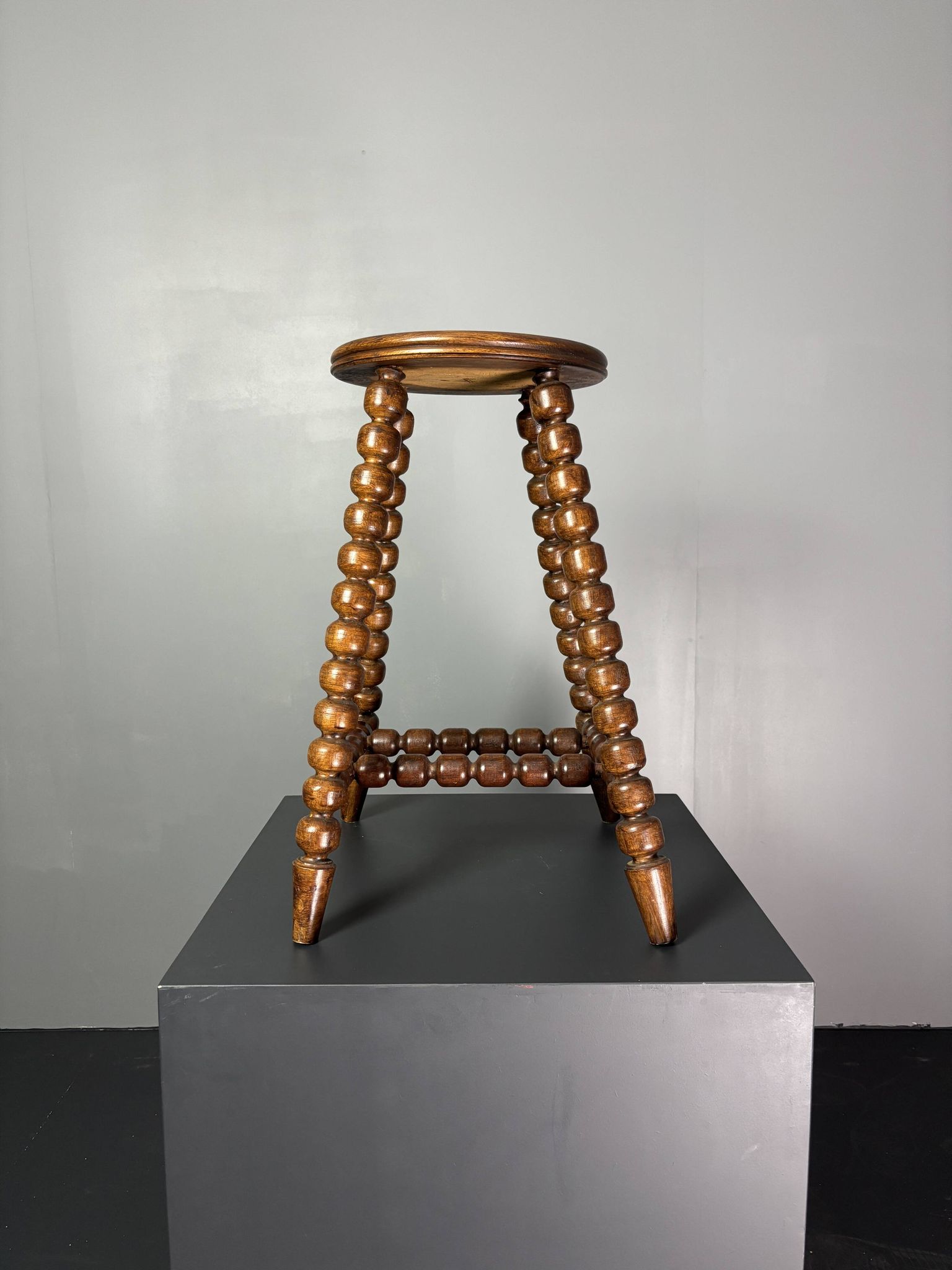Midcentury brutalist wood turned stool in the style of Charles Dudouyt, 50s
