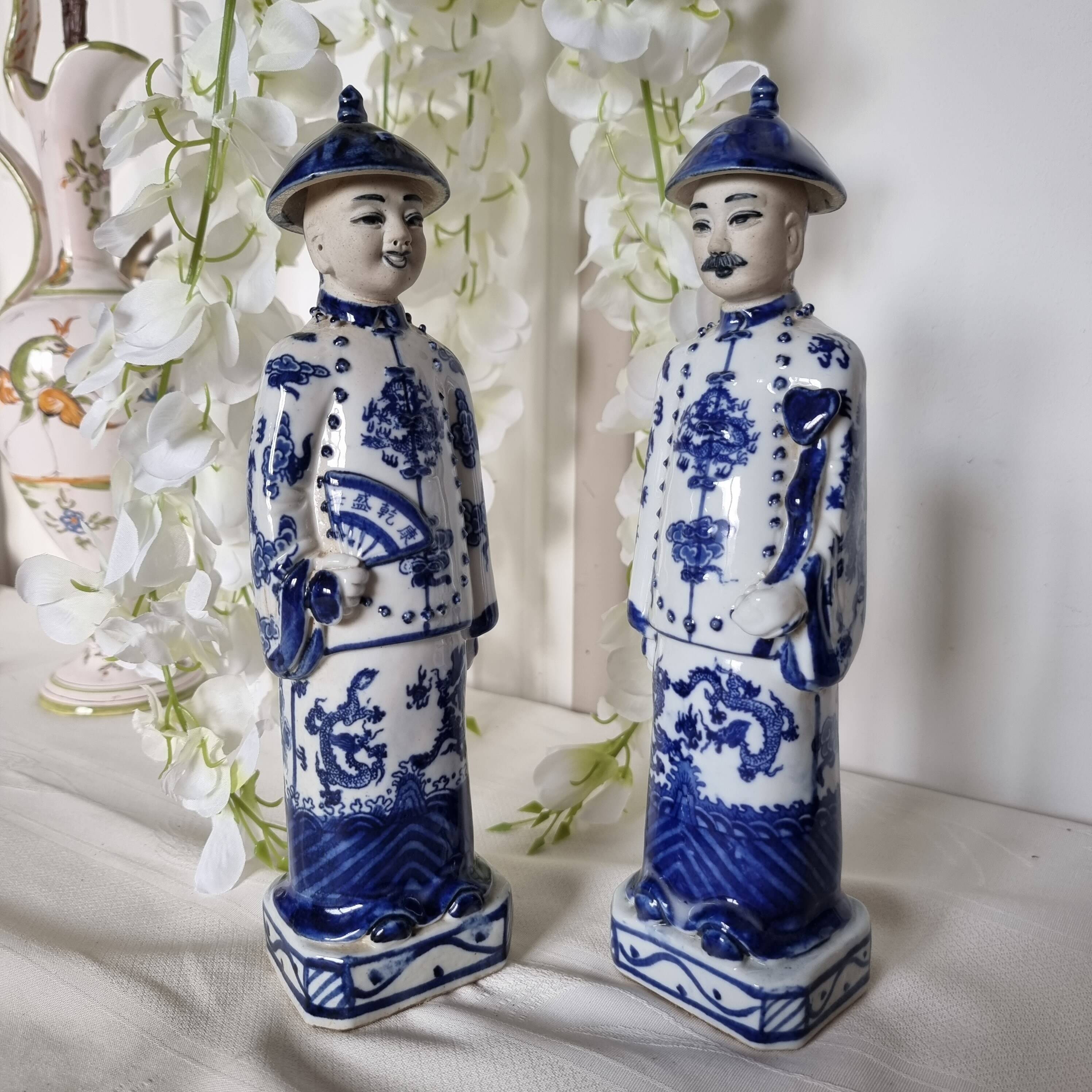 Pair of vintage Chinese blue and white porcelain figurines depicting