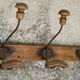 Wall-mounted coat rack with 3 hooks, 19th century.