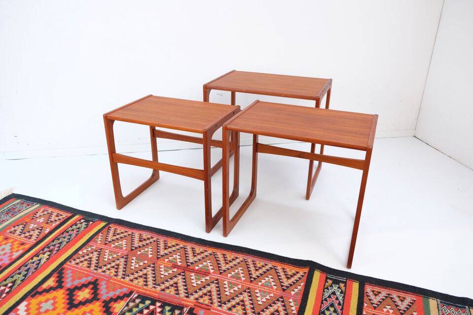 Nest tables in 1960s style, in gel-stained teak.