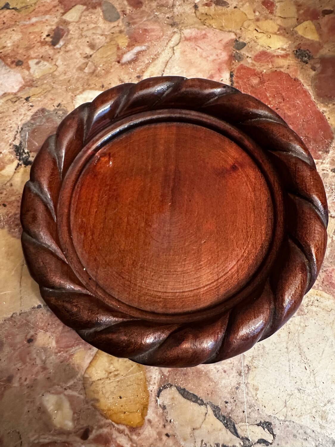 Pair of turned and carved wooden bottle coasters from the 1950s.