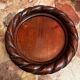 Pair of turned and carved wooden bottle coasters from the 1950s.