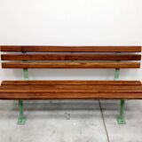 Restored and varnished garden bench in hardwood and olive green metal