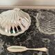 Shell-shaped metal butter dish