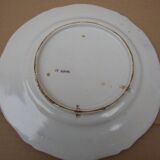 Old earthenware plate decorated with a character marked Le HAVRE
