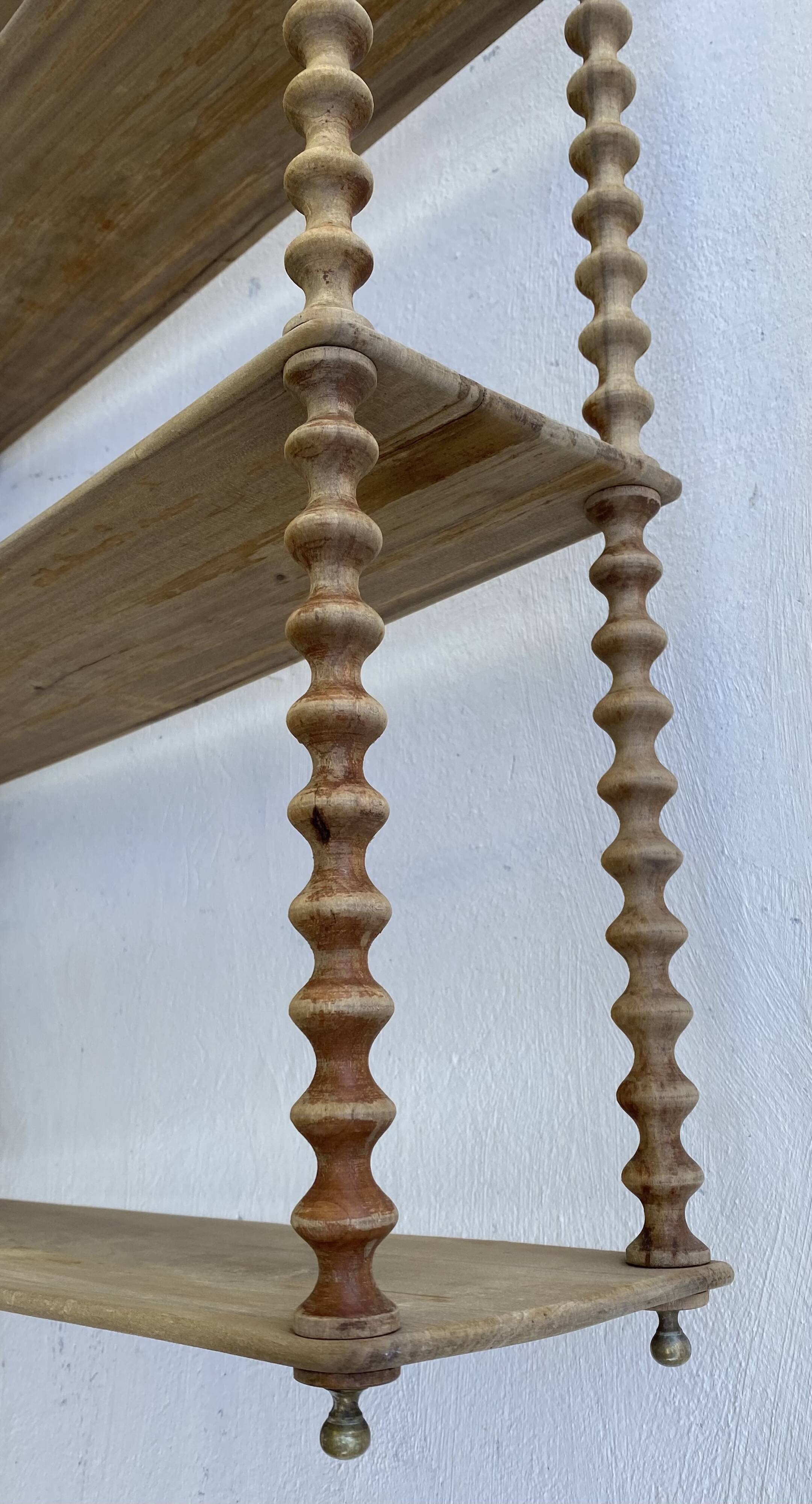 Large 19th-century turned wood wall shelf, stripped.