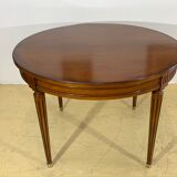 Louis XVl style round table in cherry with extensions